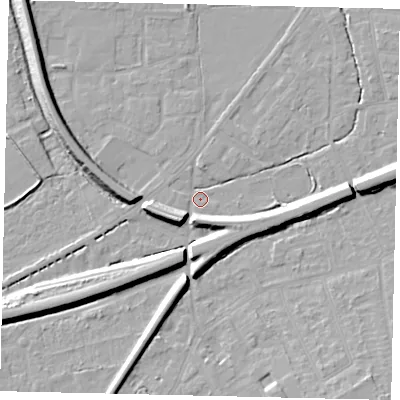 Shaded relief map of the ground around KT70DL, computed from Environment Agency LiDAR. The ground here sits at about 11 m above sea level and falls 11 m across the surrounding 800 m. Surface water reaching this point runs off ground lying to the south-west, 9.5 m higher.