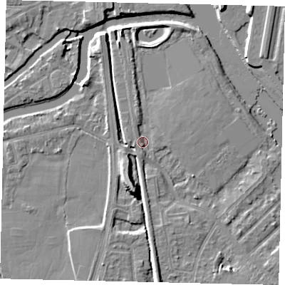 Shaded relief map of the ground around KT70QB, computed from Environment Agency LiDAR. The ground here sits at about 7 m above sea level and falls 9 m across the surrounding 800 m. Surface water reaching this point runs off ground lying to the north, 2.4 m higher.