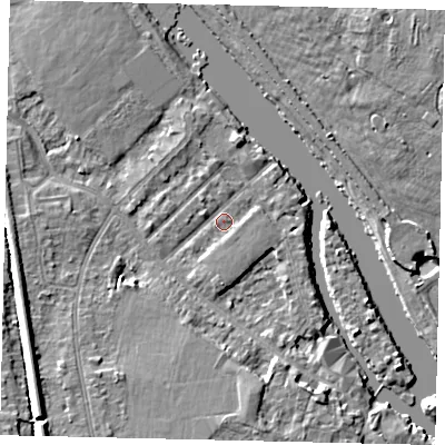 Shaded relief map of the ground around KT70QT, computed from Environment Agency LiDAR. The ground here sits at about 7 m above sea level and falls 8 m across the surrounding 800 m. Surface water reaching this point runs off ground lying to the south, 4.1 m higher.