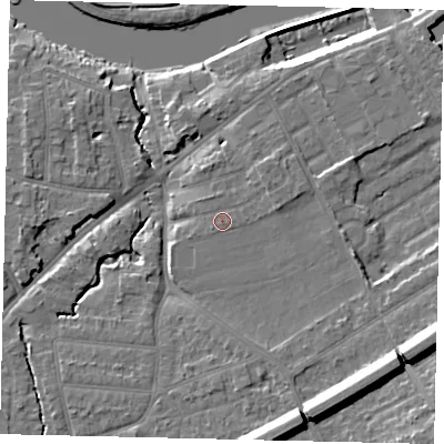 Shaded relief map of the ground around KT70UF, computed from Environment Agency LiDAR. The ground here sits at about 11 m above sea level and falls 15 m across the surrounding 800 m. Surface water reaching this point runs off ground lying to the east-north-east, 1.3 m higher.