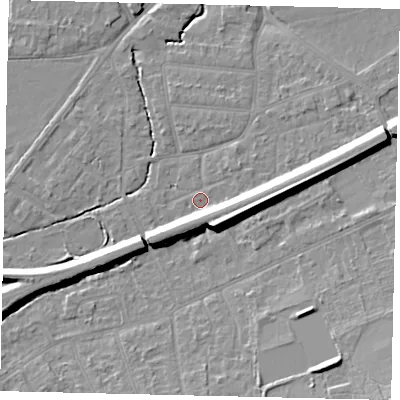 Shaded relief map of the ground around KT70UP, computed from Environment Agency LiDAR. The ground here sits at about 11 m above sea level and falls 12 m across the surrounding 800 m. Surface water reaching this point runs off ground lying to the east, 7.1 m higher.