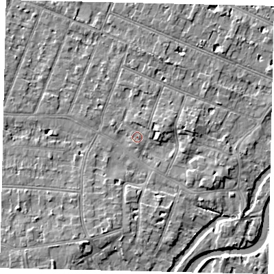 Shaded relief map of the ground around KT80DN, computed from Environment Agency LiDAR. The ground here sits at about 9 m above sea level and falls 6 m across the surrounding 800 m. Surface water reaching this point runs off ground lying to the north-north-east, 1.2 m higher.
