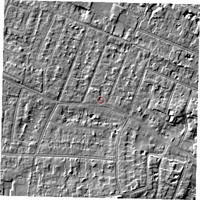 Shaded relief map of the ground around KT80DT, computed from Environment Agency LiDAR. The ground here sits at about 9 m above sea level and falls 5 m across the surrounding 800 m. Surface water reaching this point runs off ground lying to the south-south-west, 4.4 m higher.