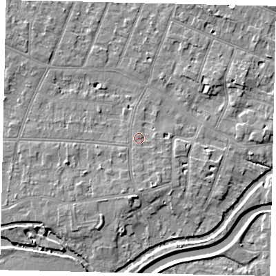 Shaded relief map of the ground around KT80SP, computed from Environment Agency LiDAR. The ground here sits at about 10 m above sea level and falls 6 m across the surrounding 800 m. Surface water reaching this point runs off ground lying to the south, 1.8 m higher.