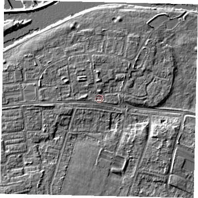 Shaded relief map of the ground around KT81TA, computed from Environment Agency LiDAR. The ground here sits at about 9 m above sea level and falls 8 m across the surrounding 800 m. Surface water reaching this point runs off ground lying to the north, 2.2 m higher.