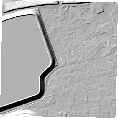 Shaded relief map of the ground around KT82AE, computed from Environment Agency LiDAR. The ground here sits at about 10 m above sea level and falls 18 m across the surrounding 800 m. Surface water reaching this point runs off ground lying to the west, 11.0 m higher.