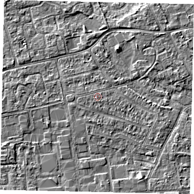 Shaded relief map of the ground around KT82ET, computed from Environment Agency LiDAR. The ground here sits at about 11 m above sea level and falls 5 m across the surrounding 800 m. Surface water reaching this point runs off ground lying to the west-south-west, 0.7 m higher.