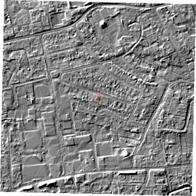Shaded relief map of the ground around KT82EZ, computed from Environment Agency LiDAR. The ground here sits at about 11 m above sea level and falls 4 m across the surrounding 800 m. Surface water reaching this point runs off ground lying to the west, 1.0 m higher.