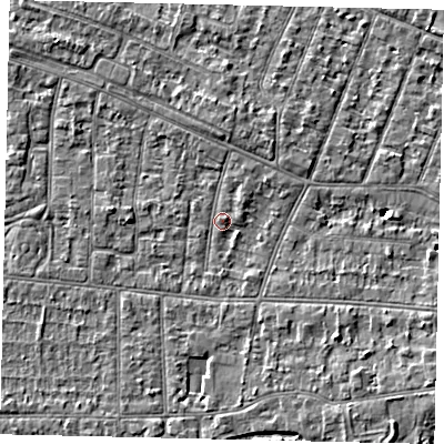 Shaded relief map of the ground around KT82HX, computed from Environment Agency LiDAR. The ground here sits at about 10 m above sea level and falls 4 m across the surrounding 800 m. Surface water reaching this point runs off ground lying to the south-east, 2.3 m higher.