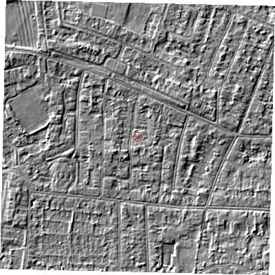 Shaded relief map of the ground around KT82JB, computed from Environment Agency LiDAR. The ground here sits at about 9 m above sea level and falls 3 m across the surrounding 800 m. Surface water reaching this point runs off ground lying to the south-west, 1.4 m higher.
