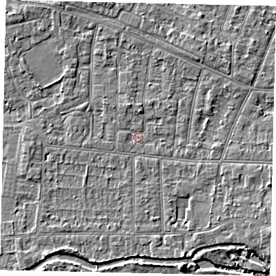 Shaded relief map of the ground around KT82JP, computed from Environment Agency LiDAR. The ground here sits at about 9 m above sea level and falls 4 m across the surrounding 800 m. Surface water reaching this point runs off ground lying to the north-north-west, 1.5 m higher.