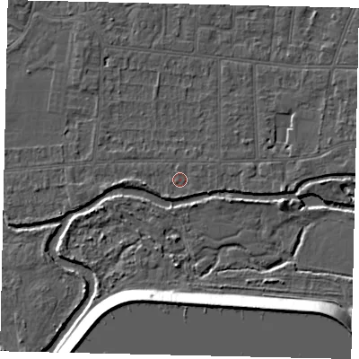 Shaded relief map of the ground around KT82LD, computed from Environment Agency LiDAR. The ground here sits at about 10 m above sea level and falls 12 m across the surrounding 800 m. Surface water reaching this point runs off ground lying to the south-south-west, 1.1 m higher.