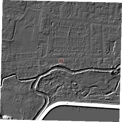 Shaded relief map of the ground around KT82LE, computed from Environment Agency LiDAR. The ground here sits at about 10 m above sea level and falls 12 m across the surrounding 800 m. Surface water reaching this point runs off ground lying to the south-east, 1.5 m higher.