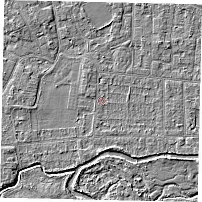 Shaded relief map of the ground around KT82LG, computed from Environment Agency LiDAR. The ground here sits at about 10 m above sea level and falls 4 m across the surrounding 800 m. Surface water reaching this point runs off ground lying to the south, 1.6 m higher.