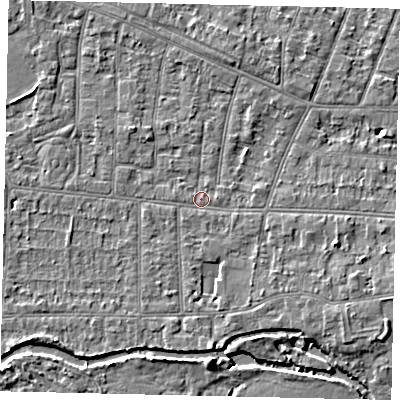 Shaded relief map of the ground around KT82PG, computed from Environment Agency LiDAR. The ground here sits at about 9 m above sea level and falls 5 m across the surrounding 800 m. Surface water reaching this point runs off ground lying to the south, 2.7 m higher.
