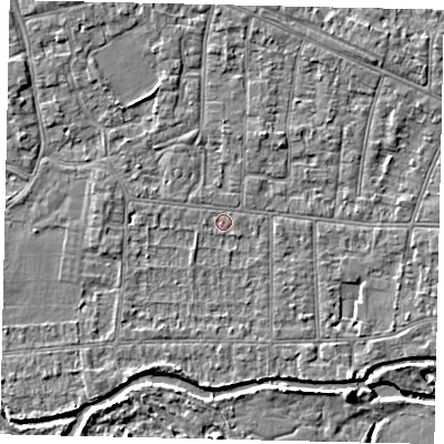 Shaded relief map of the ground around KT82PH, computed from Environment Agency LiDAR. The ground here sits at about 9 m above sea level and falls 4 m across the surrounding 800 m. Surface water reaching this point runs off ground lying to the west, 1.4 m higher.