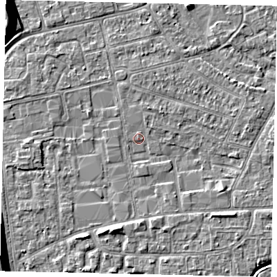 Shaded relief map of the ground around KT82QT, computed from Environment Agency LiDAR. The ground here sits at about 11 m above sea level and falls 12 m across the surrounding 800 m. Surface water reaching this point runs off ground lying to the south, 2.0 m higher.