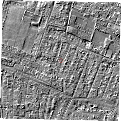 Shaded relief map of the ground around KT89EB, computed from Environment Agency LiDAR. The ground here sits at about 9 m above sea level and falls 5 m across the surrounding 800 m. Surface water reaching this point runs off ground lying to the west, 2.1 m higher.