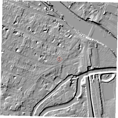 Shaded relief map of the ground around KT89ER, computed from Environment Agency LiDAR. The ground here sits at about 9 m above sea level and falls 9 m across the surrounding 800 m. Surface water reaching this point runs off ground lying to the west, 2.0 m higher.
