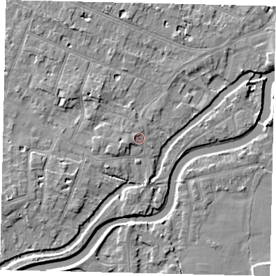 Shaded relief map of the ground around KT89HT, computed from Environment Agency LiDAR. The ground here sits at about 9 m above sea level and falls 7 m across the surrounding 800 m. Surface water reaching this point runs off ground lying to the west-north-west, 1.6 m higher.