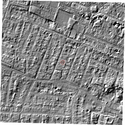 Shaded relief map of the ground around KT89LD, computed from Environment Agency LiDAR. The ground here sits at about 9 m above sea level and falls 4 m across the surrounding 800 m. Surface water reaching this point runs off ground lying to the east-south-east, 4.4 m higher.