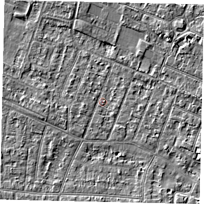 Shaded relief map of the ground around KT89LG, computed from Environment Agency LiDAR. The ground here sits at about 9 m above sea level and falls 4 m across the surrounding 800 m. Surface water reaching this point runs off ground lying to the west-south-west, 2.2 m higher.
