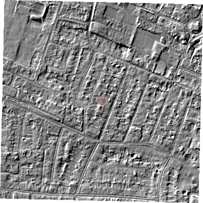 Shaded relief map of the ground around KT89LW, computed from Environment Agency LiDAR. The ground here sits at about 9 m above sea level and falls 4 m across the surrounding 800 m. Surface water reaching this point runs off ground lying to the south-west, 1.2 m higher.