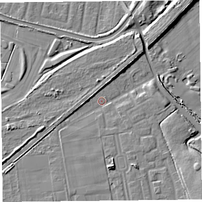 Shaded relief map of the ground around L101NB, computed from Environment Agency LiDAR. The ground here sits at about 18 m above sea level and falls 13 m across the surrounding 800 m. Surface water reaching this point runs off ground lying to the south, 7.3 m higher.