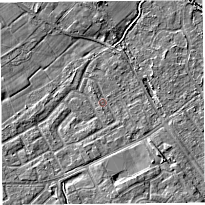 Shaded relief map of the ground around L124XY, computed from Environment Agency LiDAR. The ground here sits at about 21 m above sea level and falls 7 m across the surrounding 800 m. Surface water reaching this point runs off ground lying to the south, 1.6 m higher.