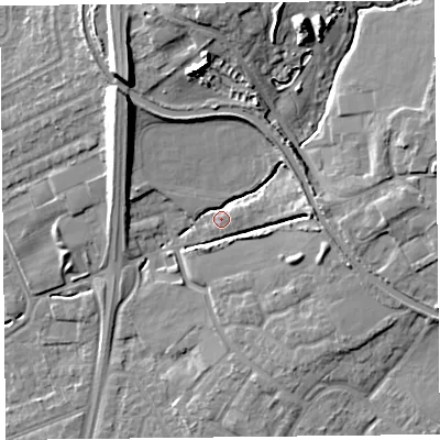 Shaded relief map of the ground around L313DY, computed from Environment Agency LiDAR. The ground here sits at about 13 m above sea level and falls 17 m across the surrounding 800 m. Surface water reaching this point runs off ground lying to the north-west, 9.9 m higher.