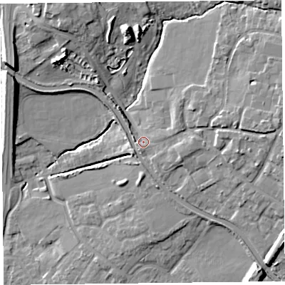 Shaded relief map of the ground around L313DZ, computed from Environment Agency LiDAR. The ground here sits at about 16 m above sea level and falls 15 m across the surrounding 800 m. Surface water reaching this point runs off ground lying to the north, 11.6 m higher.