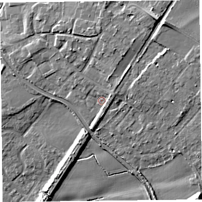 Shaded relief map of the ground around L313HP, computed from Environment Agency LiDAR. The ground here sits at about 18 m above sea level and falls 15 m across the surrounding 800 m. Surface water reaching this point runs off ground lying to the east-north-east, 3.8 m higher.