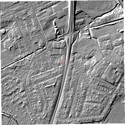 Shaded relief map of the ground around L317BQ, computed from Environment Agency LiDAR. The ground here sits at about 10 m above sea level and falls 13 m across the surrounding 800 m. Surface water reaching this point runs off ground lying to the east, 0.6 m higher.