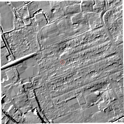 Shaded relief map of the ground around L318AH, computed from Environment Agency LiDAR. The ground here sits at about 7 m above sea level and falls 9 m across the surrounding 800 m. Surface water reaching this point runs off ground lying to the east-north-east, 5.2 m higher.