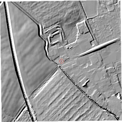 Shaded relief map of the ground around L318BT, computed from Environment Agency LiDAR. The ground here sits at about 5 m above sea level and falls 9 m across the surrounding 800 m. Surface water reaching this point runs off ground lying to the east-south-east, 7.7 m higher.