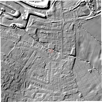 Shaded relief map of the ground around L354PS, computed from Environment Agency LiDAR. The ground here sits at about 63 m above sea level and falls 15 m across the surrounding 800 m. Surface water reaching this point runs off ground lying to the north-north-west, 7.4 m higher.