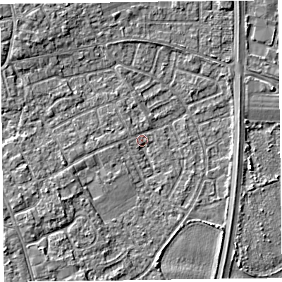 Shaded relief map of the ground around L374EW, computed from Environment Agency LiDAR. The ground here sits at about 5 m above sea level and falls 4 m across the surrounding 800 m. Surface water reaching this point runs off ground lying to the west-south-west, 2.4 m higher.