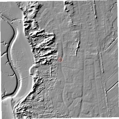 Shaded relief map of the ground around L389EY, computed from Environment Agency LiDAR. The ground here sits at about 9 m above sea level and falls 15 m across the surrounding 800 m. Surface water reaching this point runs off ground lying to the west, 6.9 m higher.