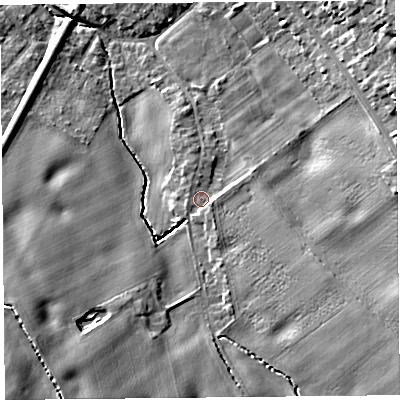 Shaded relief map of the ground around L394RG, computed from Environment Agency LiDAR. The ground here sits at about 50 m above sea level and falls 17 m across the surrounding 800 m. Surface water reaching this point runs off ground lying to the south-east, 1.6 m higher.