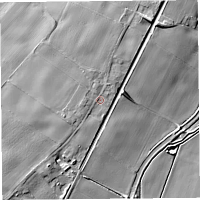 Shaded relief map of the ground around L404AZ, computed from Environment Agency LiDAR. The ground here sits at about 13 m above sea level and falls 12 m across the surrounding 800 m. Surface water reaching this point runs off ground lying to the west-south-west, 2.4 m higher.