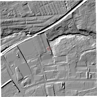 Shaded relief map of the ground around L99AA, computed from Environment Agency LiDAR. The ground here sits at about 23 m above sea level and falls 12 m across the surrounding 800 m. Surface water reaching this point runs off ground lying to the south-south-east, 8.5 m higher.