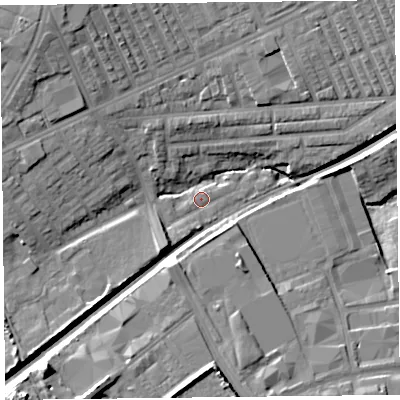 Shaded relief map of the ground around L99AN, computed from Environment Agency LiDAR. The ground here sits at about 23 m above sea level and falls 14 m across the surrounding 800 m. Surface water reaching this point runs off ground lying to the north-west, 11.9 m higher.