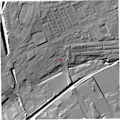 Shaded relief map of the ground around L99AQ, computed from Environment Agency LiDAR. The ground here sits at about 26 m above sea level and falls 15 m across the surrounding 800 m. Surface water reaching this point runs off ground lying to the north-west, 10.5 m higher.