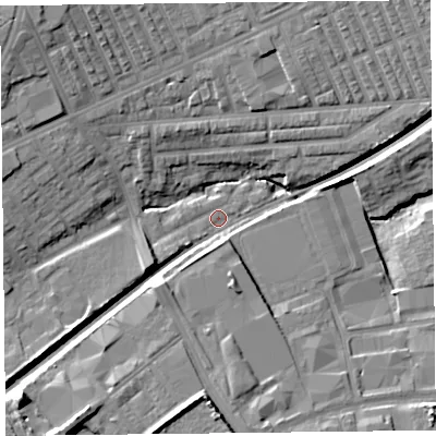 Shaded relief map of the ground around L99AW, computed from Environment Agency LiDAR. The ground here sits at about 23 m above sea level and falls 14 m across the surrounding 800 m. Surface water reaching this point runs off ground lying to the north-west, 13.8 m higher.