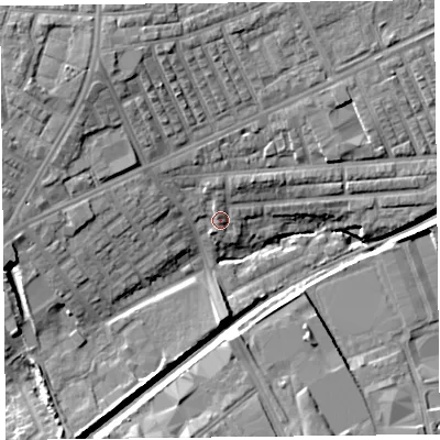 Shaded relief map of the ground around L99DD, computed from Environment Agency LiDAR. The ground here sits at about 26 m above sea level and falls 14 m across the surrounding 800 m. Surface water reaching this point runs off ground lying to the north-west, 9.5 m higher.