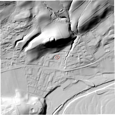 Shaded relief map of the ground around LA105AN, computed from Environment Agency LiDAR. The ground here sits at about 123 m above sea level and falls 86 m across the surrounding 800 m. Surface water reaching this point runs off ground lying to the north-north-west, 56.3 m higher.