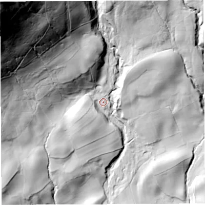 Shaded relief map of the ground around LA105LJ, computed from Environment Agency LiDAR. The ground here sits at about 181 m above sea level and falls 258 m across the surrounding 800 m. Surface water reaching this point runs off ground lying to the north-west, 216.6 m higher.