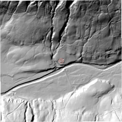 Shaded relief map of the ground around LA105PG, computed from Environment Agency LiDAR. The ground here sits at about 227 m above sea level and falls 136 m across the surrounding 800 m. Surface water reaching this point runs off ground lying to the north, 13.6 m higher.