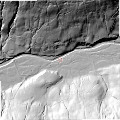 Shaded relief map of the ground around LA105PQ, computed from Environment Agency LiDAR. The ground here sits at about 221 m above sea level and falls 111 m across the surrounding 800 m. Surface water reaching this point runs off ground lying to the north, 103.1 m higher.