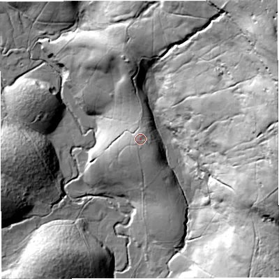 Shaded relief map of the ground around LA105PS, computed from Environment Agency LiDAR. The ground here sits at about 363 m above sea level and falls 102 m across the surrounding 800 m. Surface water reaching this point runs off ground lying to the north, 2.4 m higher.